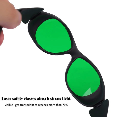180-750Nm Laser Safety Goggles For Engraving And Cutting Pro Grade Protective Eyewear With Green Tint shown in hand.