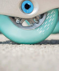 Durable Blue Alloy Skateboard Axle Screw Replacement Kit For Inline Roller Skates With Eight Metal Bolts To Keep Wheels Locked Tight During Any Crazy Session And Prevent Rust BuildUp Issues Ensuring Your Board Runs Smooth Without Wobble Or Damage, close-up on wheel