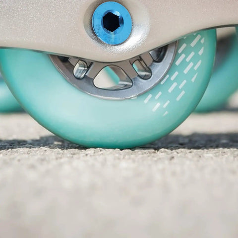 Durable Blue Alloy Skateboard Axle Screw Replacement Kit For Inline Roller Skates With Eight Metal Bolts To Keep Wheels Locked Tight During Any Crazy Session And Prevent Rust BuildUp Issues Ensuring Your Board Runs Smooth Without Wobble Or Damage, close-up on wheel