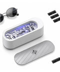 Portable Ultrasonic Jewelry Cleaner For Rings Silver Watches Retainers And Glasses Compact Countertop Machine with sunglasses and cleaning tray.