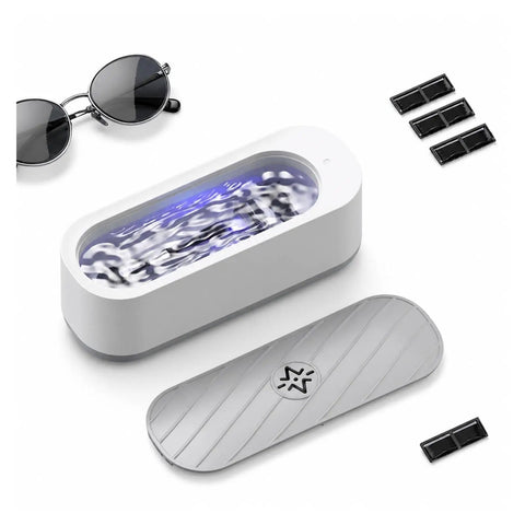 Portable Ultrasonic Jewelry Cleaner For Rings Silver Watches Retainers And Glasses Compact Countertop Machine with sunglasses and cleaning tray.