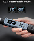 Close-up of a 3/8 inch digital torque wrench display showing dual measurement modes with hands holding it