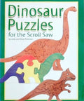 Book cover displaying Dinosaur Puzzles for Scroll Saw featuring colorful dinosaur puzzle designs.