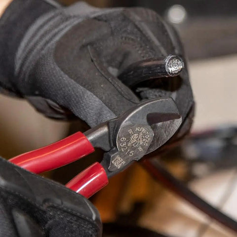 Sleek Six Point Five Inch Compact Cable Cutter Featuring High Leverage Action for Aluminum and Copper Wire Snipping in use.