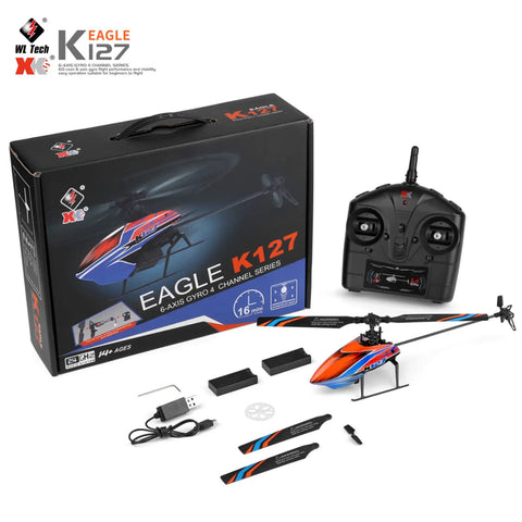 4 Channel RC Helicopter K127 With 6 Axis Gyro, Altitude Hold, packaging and remote with additional parts and batteries displayed