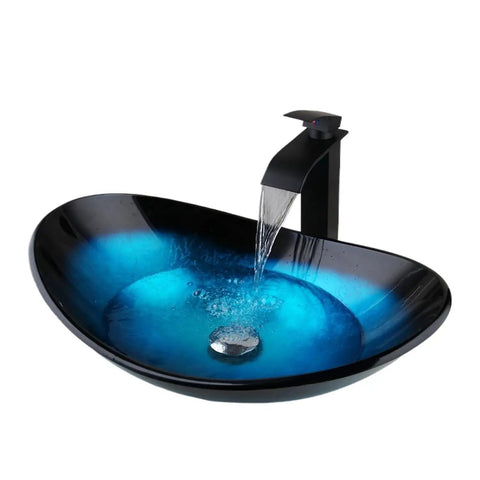 Blue Oval Glass Vessel Sink With Waterfall Faucet And Pop Up Drain Above Counter Bathroom Vessel Sink Artistic Tempered Glass Bowl