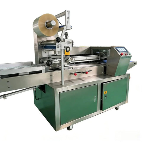 Hassle Free Compact Horizontal Flow Packager And Slick Shrink Wrapping Machine cranking fifty to eighty packages per minute for bakeries.