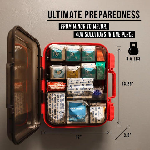Front view of open red first aid kit with 400 pieces, assorted bandages, gauze, gloves and supplies.