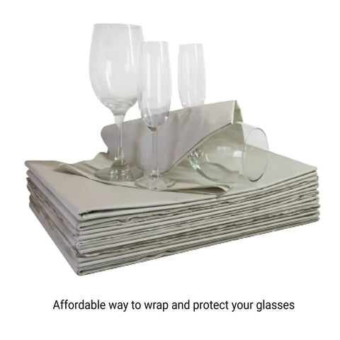 Stack of Moving Packing Paper Sheets 31 By 21.5 Inches, 50 Pack Newsprint Paper with glassware, Eco Friendly for fragile wrapping