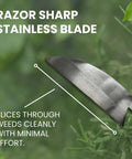 Close-up of Hounen Miyawaki Japanese Weeding Sickle Twisted Stainless Kama Weeder slicing through greenery, showcasing blade edge.