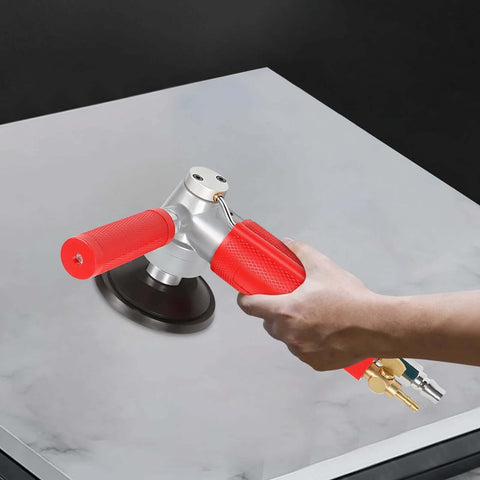 4-inch pneumatic wet stone polisher with red handles, side view used on marble surface, 4300 RPM