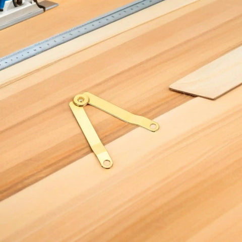 Gold Iron Lid Support Hinges For Small Boxes on wooden surface, Heavy Duty Hinge Set For Jewelry Boxes And Treasure Chests