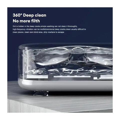 Portable Ultrasonic Cleaner With 360 Rotating Wash For Watches Jewelry And Dental Gear Compact Glovebox Friendly Build showing deep clean in action.