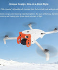 Anti Collision Gimbal Bumper Guard For Lito X1 And Lito 1 Drones in flight with orange accents, snowy landscape backdrop
