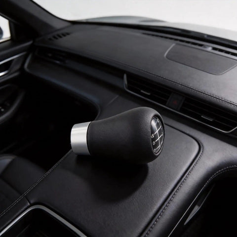Stylish Red LED 6-Speed Gear Shift Knob For BMW E30 E36 E46 E60 E90 With Cool Glowing Light, ABS Handle For Smooth Manual Shifting And Easy Car Interior Upgrades Tonight. Black manual shift knob with silver base on BMW center console