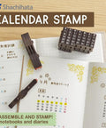 Straight Up Game Changing Perpetual Calendar Stamp Set Featuring 38 Connectable Rubber Date And Weekday Stamps For Smooth Office Admin Hacks And Boss Level Daily Planner Organization on notebook.