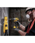 Worker using 12V Max XR Hammer Drill Bare Tool for home project, one half inch chuck, no battery included