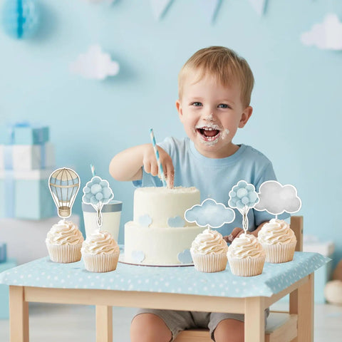 Adventure Awaits Hot Air Balloon Cupcake Toppers 36 Piece Set Blue Clouds Party Picks with child eating cake at table