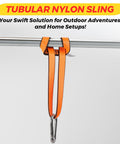 Orange tubular nylon sling hanging from bar with carabiner, focus on setup for outdoor adventures.