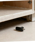 DIY Friendly Spring Loaded Cabinet Door Repair Pins Kit next to open cabinet showcasing metal pin for easy maintenance