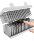 Close-up of Reusable Silicone Hair Catcher for Shower Wall and Bathroom Bathtub showing hair caught in silicone bristles.