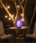 Moon Lamp Galaxy Night Light 5.9 Inch With 16 Colors LED 3D Moon Surface on a patio table at night