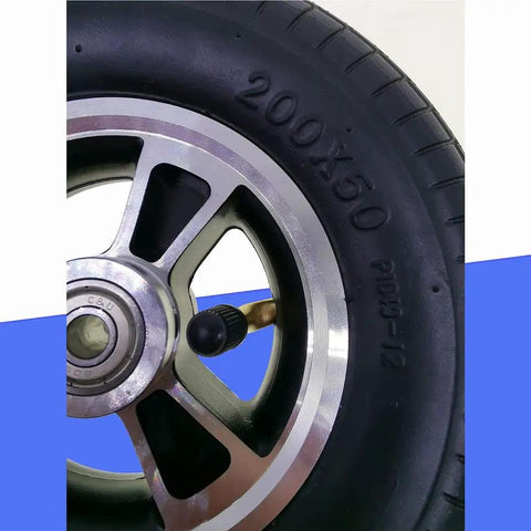 Close-up of 8 Inch X 2 Inch Wheelchair Caster Wheels With Slick Rolling Pneumatic Tires and Tough As Nails Aluminum Alloy Hubs.