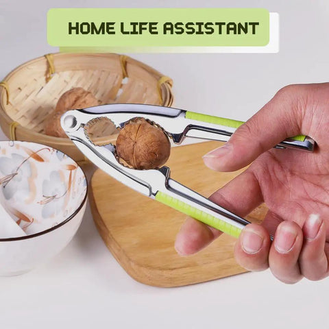 Person using Heavy Duty Nut And Shell Cracker Set With No Slip Grip Handles Seafood Tools And Picks to crack a walnut.