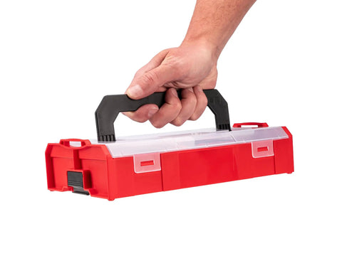 Hand holding the red and black mini stacking box of the Three Eighths Inch Drive Six Point Socket Set With Ratchet And Bits In A Grab And Go