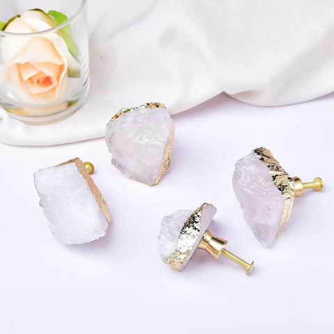 Four Crisp White Geode Cabinet Knobs With Burnished Gold Plating designed to level up your kitchen drawers, bedroom dressers.