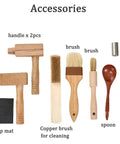 Accessories for Manual Stone Grain Mill For Dry And Wet Grinding, including brushes, wooden spoon, and anti-slip mat.