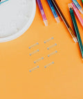 Top Notch 2O Piece Stainless Steel Compression Spring Kit For Ball Pen Rebuilds Home Repairs And Light Industrial Jobs Super Durable Silver Springs That Work Like Magic. 20 stainless steel pen springs on orange background