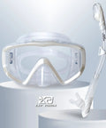 Panoramic 3 Window Snorkel Mask Set for Adults Pro Grade Anti Fog Anti Leak Dry Top Diving Gear with Hypoallergenic Silicone Skirt and Shatter Resistant PC Lens displayed on a podium.
