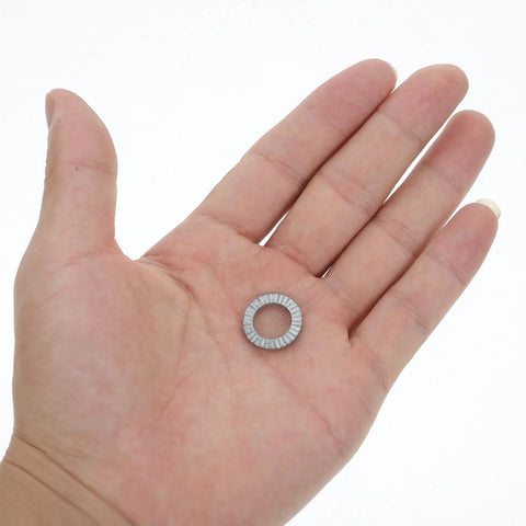 Set Of Twenty M10 Wedge Locking Washers Built Tough With Premium Manganese Steel held in hand, showing size and design for secure fastening.