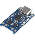 Slick TP4056 Type-C USB Charging Module for 18650 Lithium Batteries, compact board with USB-C connection, blue color.