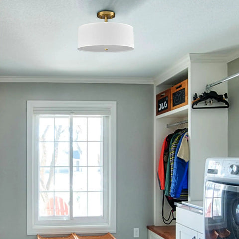 Dimmable Gold Semi Flush Mount Ceiling Light With Drum Shade, Dope 30W LED, brass finish in a modern laundry room