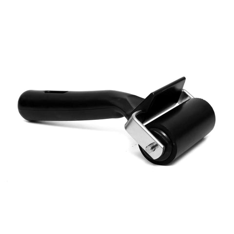 Black application roller tool for Clear No Slip Stair Treads For Indoors Anti Slip Tape For Wood Floors, handheld view