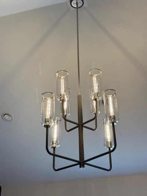 Retro Edison Look LED Filament Bulbs T10 Tubular 12W Dimmable warm glow in modern chandelier.