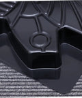 Close-up of Butterfly Shaped Paving Mold For Garden Paths And Walkways, Reusable Concrete Stepping Stone Mold, black plastic surface.