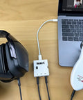 MAI Mini Mobile Audio Interface with Zero Latency Monitoring and High Fidelity Headphone Output connected to laptop