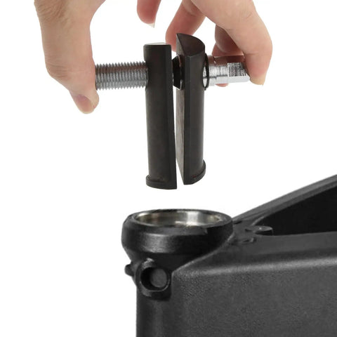 Beefy Universal Steering Neck Bearing Race Puller for 1-1/8 to 2-5/8 inch ID Races in use for motorcycle repairs