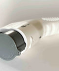 Heavy Duty J1772 Electric Charge Plug Sleeve With Durable Dust And Dirt Guard For Tesla Charging Cord, grey plug cap close-up.