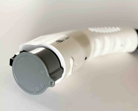 Heavy Duty J1772 Electric Charge Plug Sleeve With Durable Dust And Dirt Guard For Tesla Charging Cord, grey plug cap close-up.
