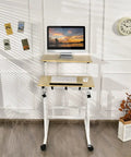 Hassle Free Rolling Height Adjustable Standing Desk With Easy Glide Casters And Extra Roomy Laptop Tray in home office setup.