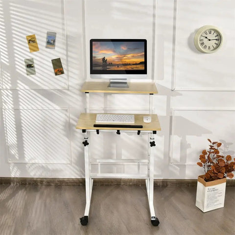 Hassle Free Rolling Height Adjustable Standing Desk With Easy Glide Casters And Extra Roomy Laptop Tray in home office setup.
