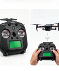 FS-ST8 8-10CH 2.4GHz RC Transmitter With FS-SR8 Receiver controlling a flying drone, ergonomic design