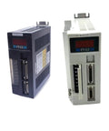 Front view of two AC servo drive modules, dark blue and light gray, with digital displays and multiple connectors.
