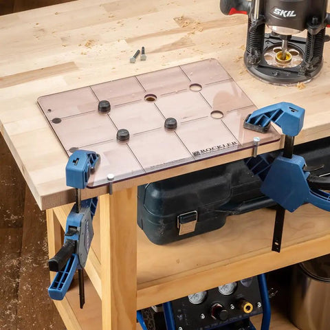 Spaced Dog Hole Router Template for Precise Holes and Bench Tools like Dogs Cookies and Holdfasts on wooden workbench with tools