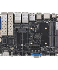 Mini Pc Tower Powered By The Atom C3958 Processor With Sixteen Gb Ram Featuring Four Ten Gigabit Sfp Plus Fiber Links Alongside Five Two Point Five Gbe Ethernet Ports In Beast Mode For Bulletproof Firewalls And Smoother Business Hubs motherboard with ports and connectors.