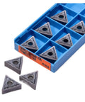 Check Out These 10 Pc Indexable Carbide Lathe Tools With Tough TNMG160408 Inserts And A Super Sharp Edge That Rocks On Stainless Steel Plus Heavy Duty Hard Alloy Turning Blades For All Your Metal Fabrication Jobs. Set of TNMG332-HA carbide inserts in a blue box.